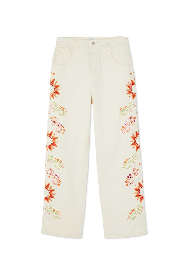 Ecru Enchanted Scallop Jeans in wide-leg denim featuring sun embroidery and scalloped pockets.