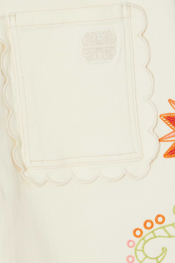 Ecru Enchanted Scallop Jeans pocket detail featuring scalloped trim, tonal embroidered logo and colourful motifs.