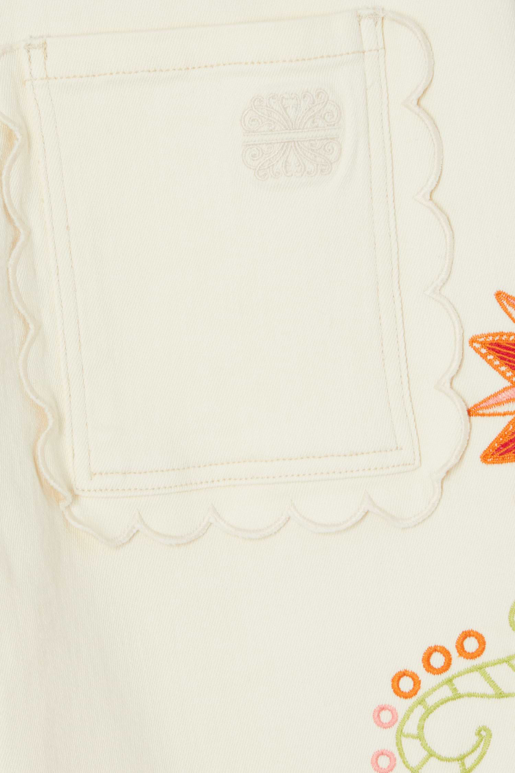 Ecru Enchanted Scallop Jeans pocket detail featuring scalloped trim, tonal embroidered logo and colourful motifs.