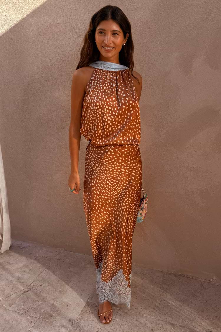 Multi-wear Fawn Lily Top and matching Maeva maxi skirt co-ord in a brown fawn print with blue tie neck detail.
