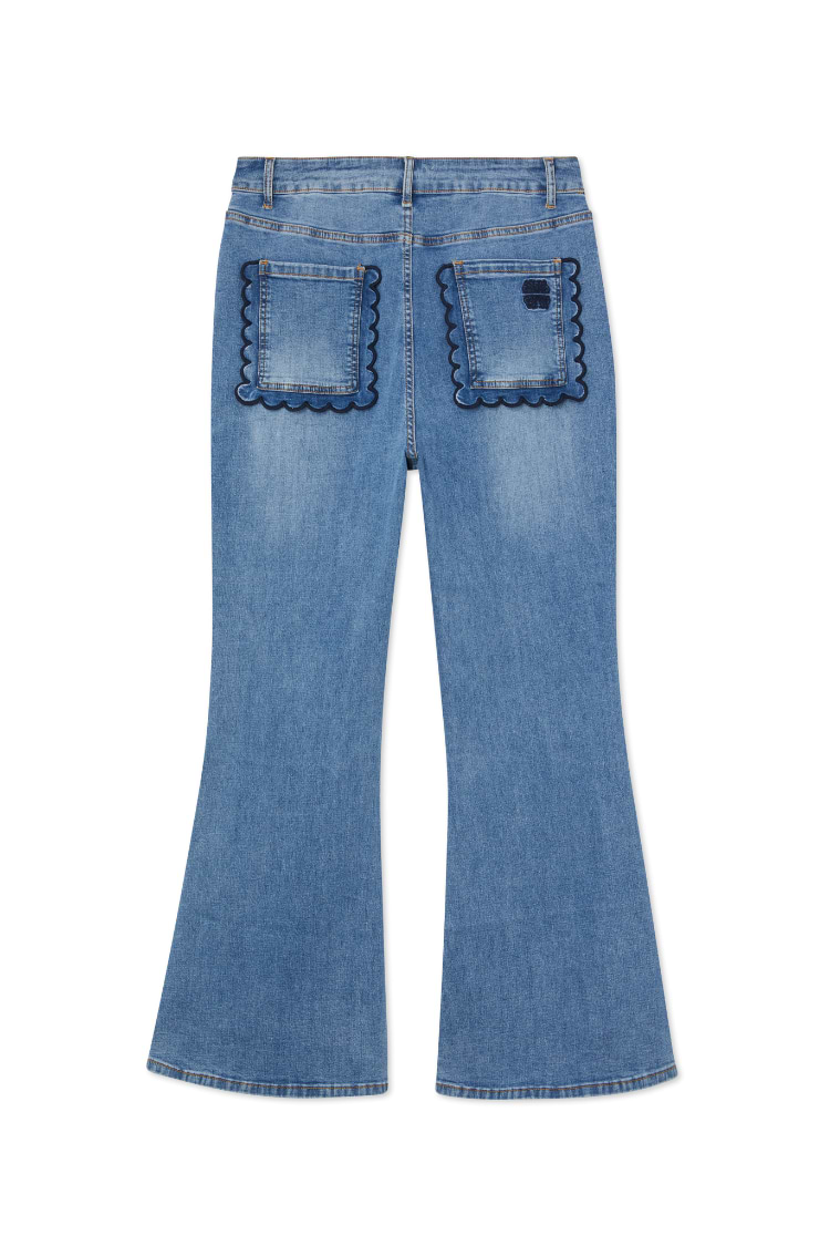 Blue Denim Flare Scallop Jeans featuring dark navy scalloped back pockets and a 70s-inspired flared silhouette.