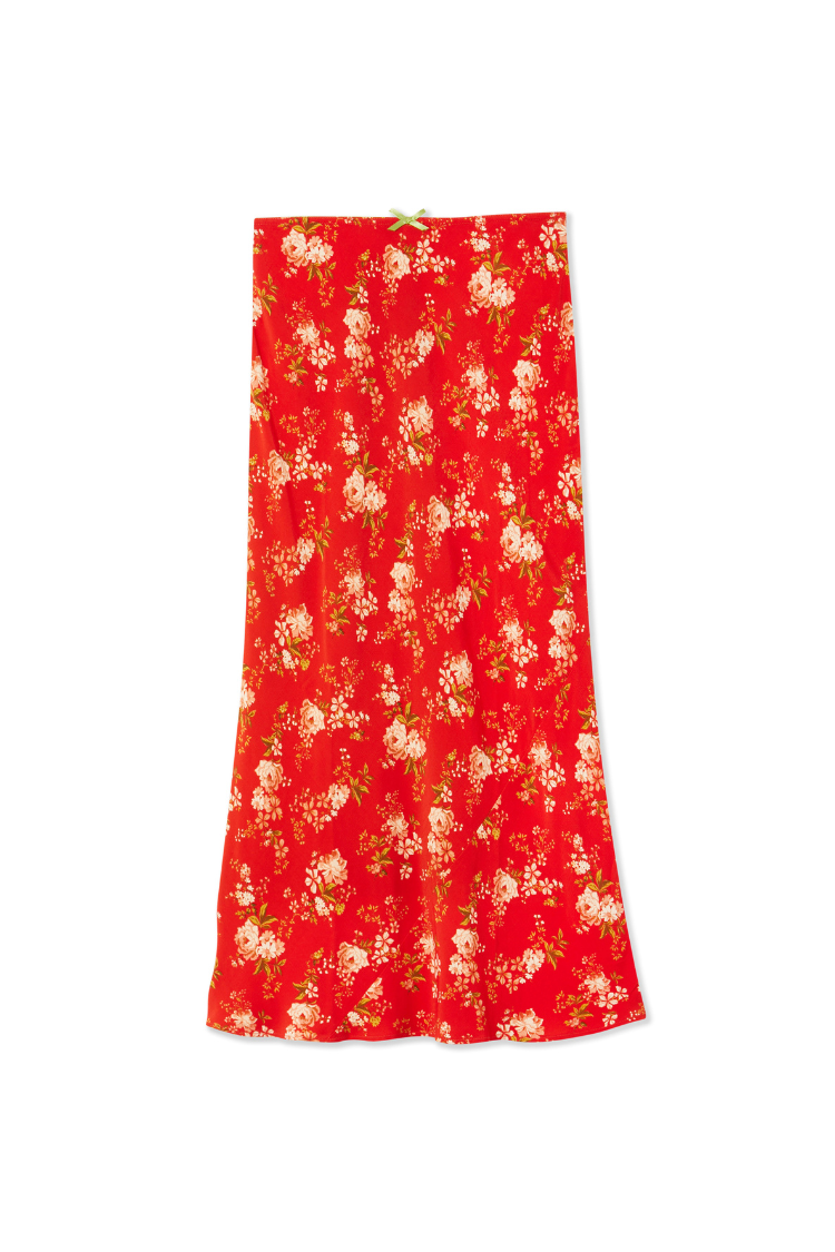 Red Floral Midi Skirt featuring a white flower print, elasticated waistband, and a small contrast green bow.