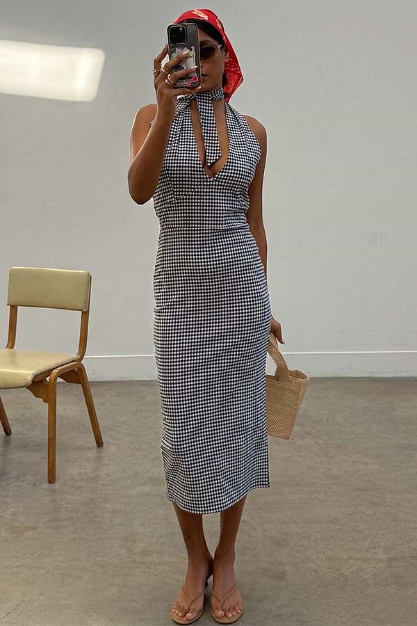 Black and white Gingham Halterneck Dress with a retro tie neck and back slit, designed in London.