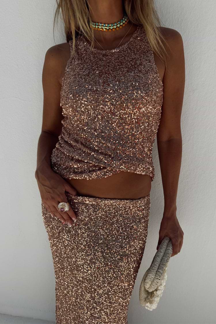 Gold Sequin Tank Top and matching sequin skirt styled with layered beaded necklaces.