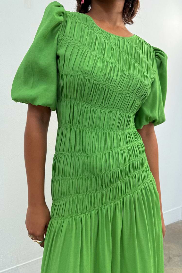 Green Shirred Nara Dress with a shirred bodice and puff sleeves for multi-wear styling.