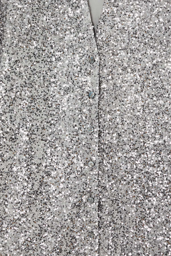 Detail of the Gunmetal Sequin Miley Shirt highlighting shimmering silver sequins and button-up fastening.