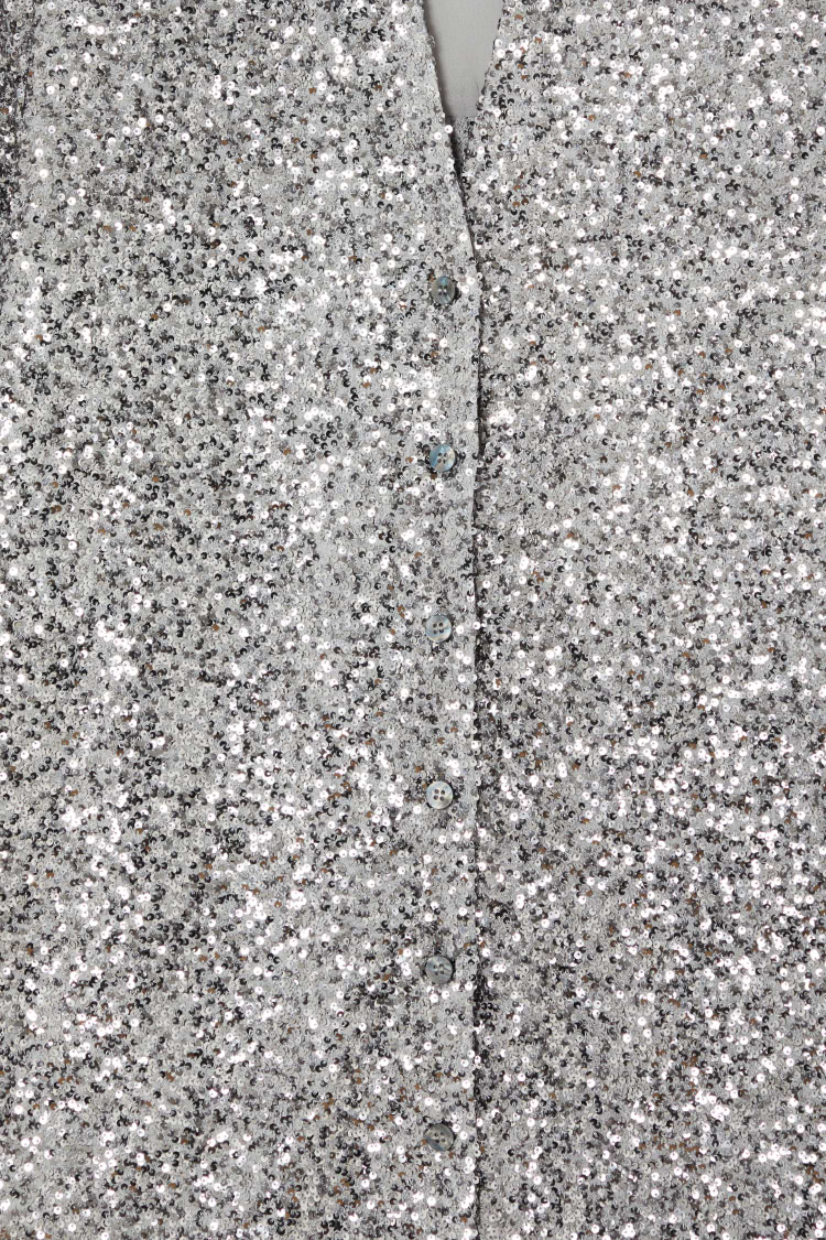 Detail of the Gunmetal Sequin Miley Shirt highlighting shimmering silver sequins and button-up fastening.