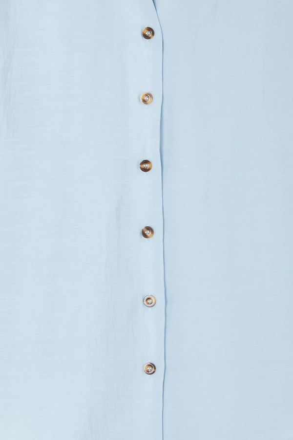 Ice Blue Miley Shirt detail with contrast tortoise buttons on sky blue, lightweight and slightly sheer fabric.