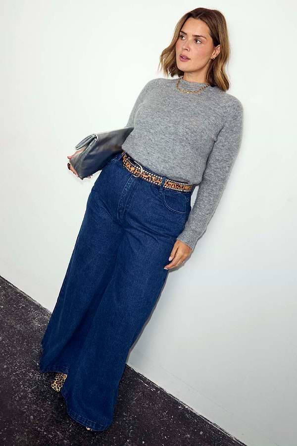 Blue Denim Pallazzo Jan Jean with a wide-leg fit, styled with a grey knit and leopard print belt on a size 18 model.