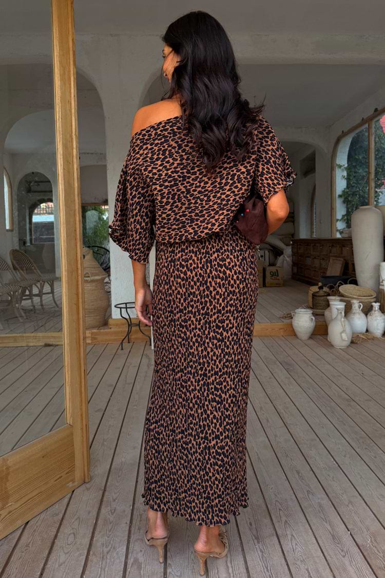 Lucia Leopard Tilly Dress in iconic leopard print plisse, showing the back view and off-the-shoulder styling.