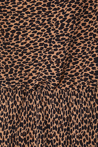 Lucia Leopard Tilly Dress detail highlighting the iconic leopard print and textured plissé fabric.