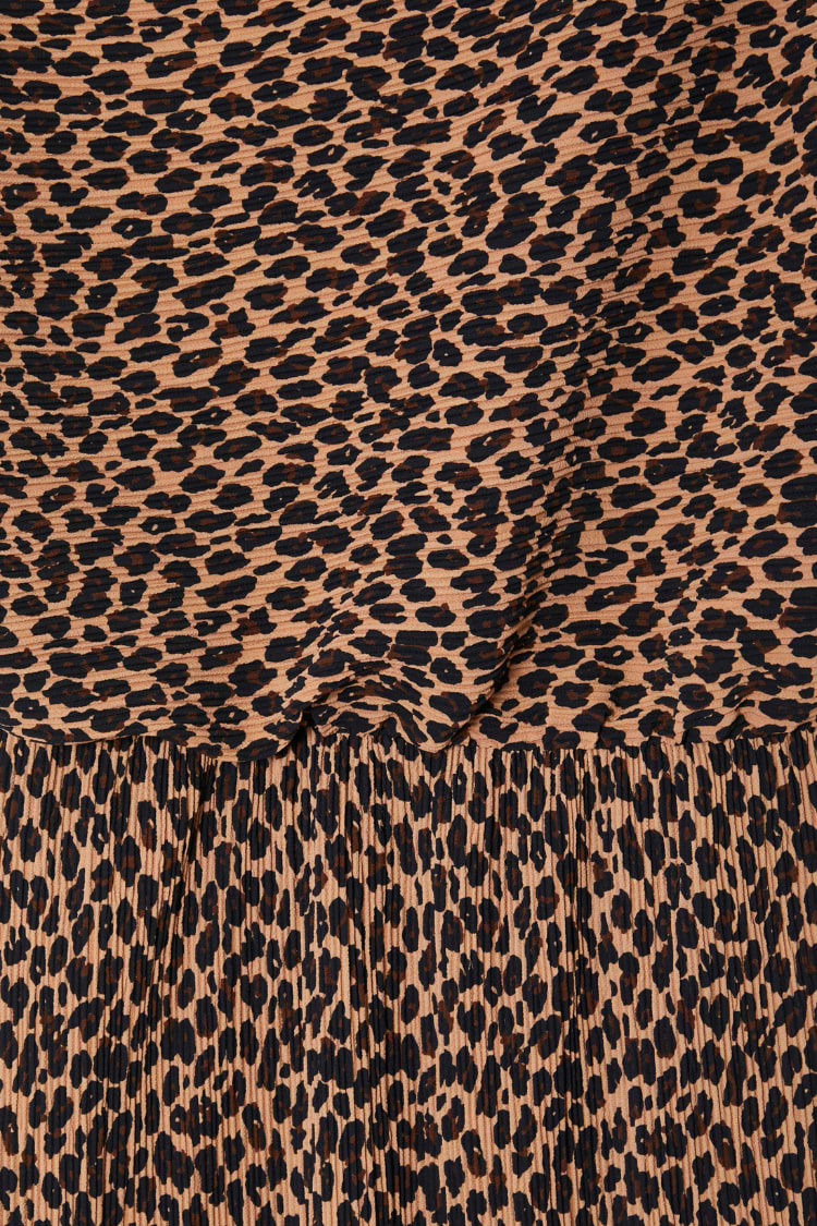 Lucia Leopard Tilly Dress detail highlighting the iconic leopard print and textured plissé fabric.