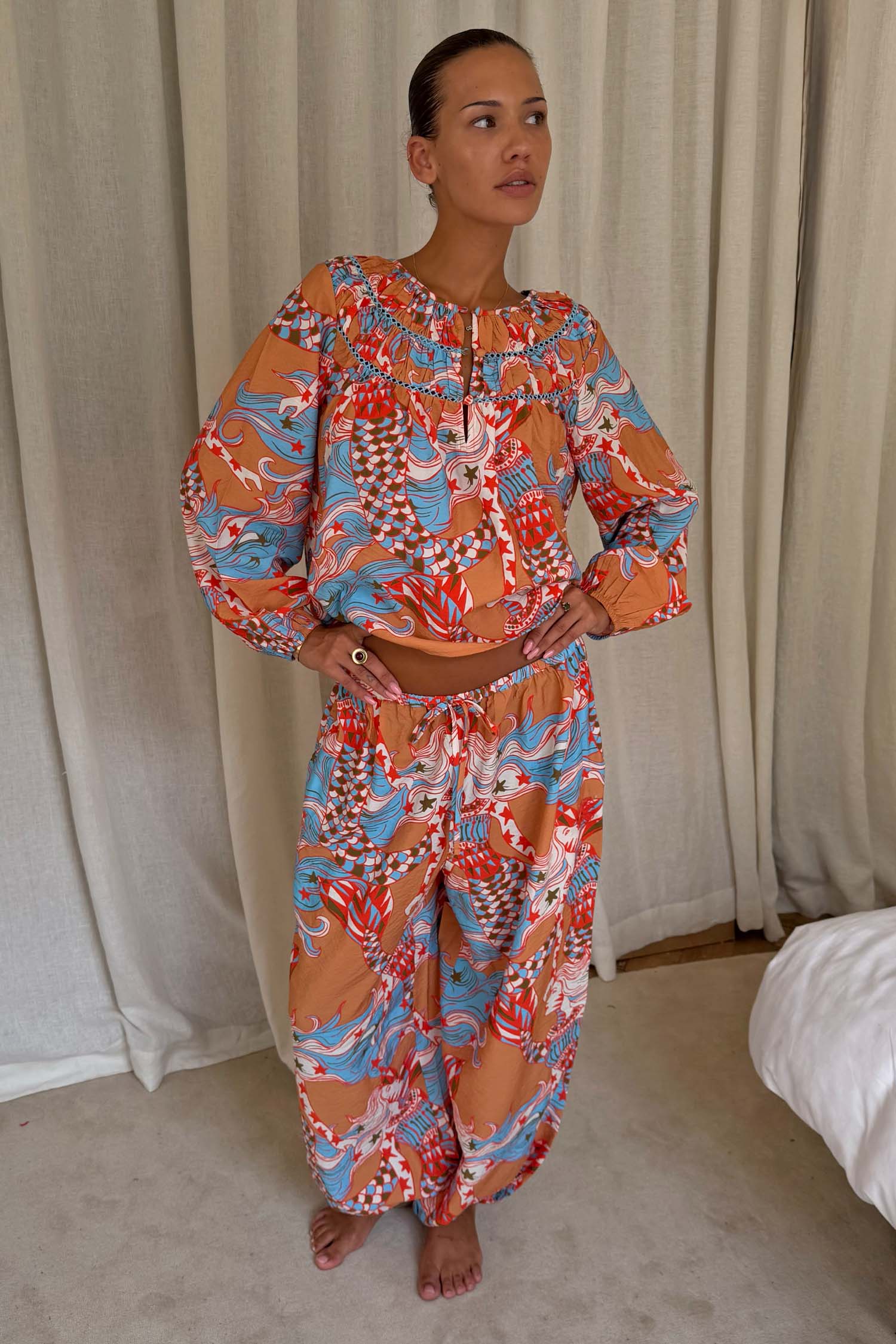 Model is 5ft4” and wears size M