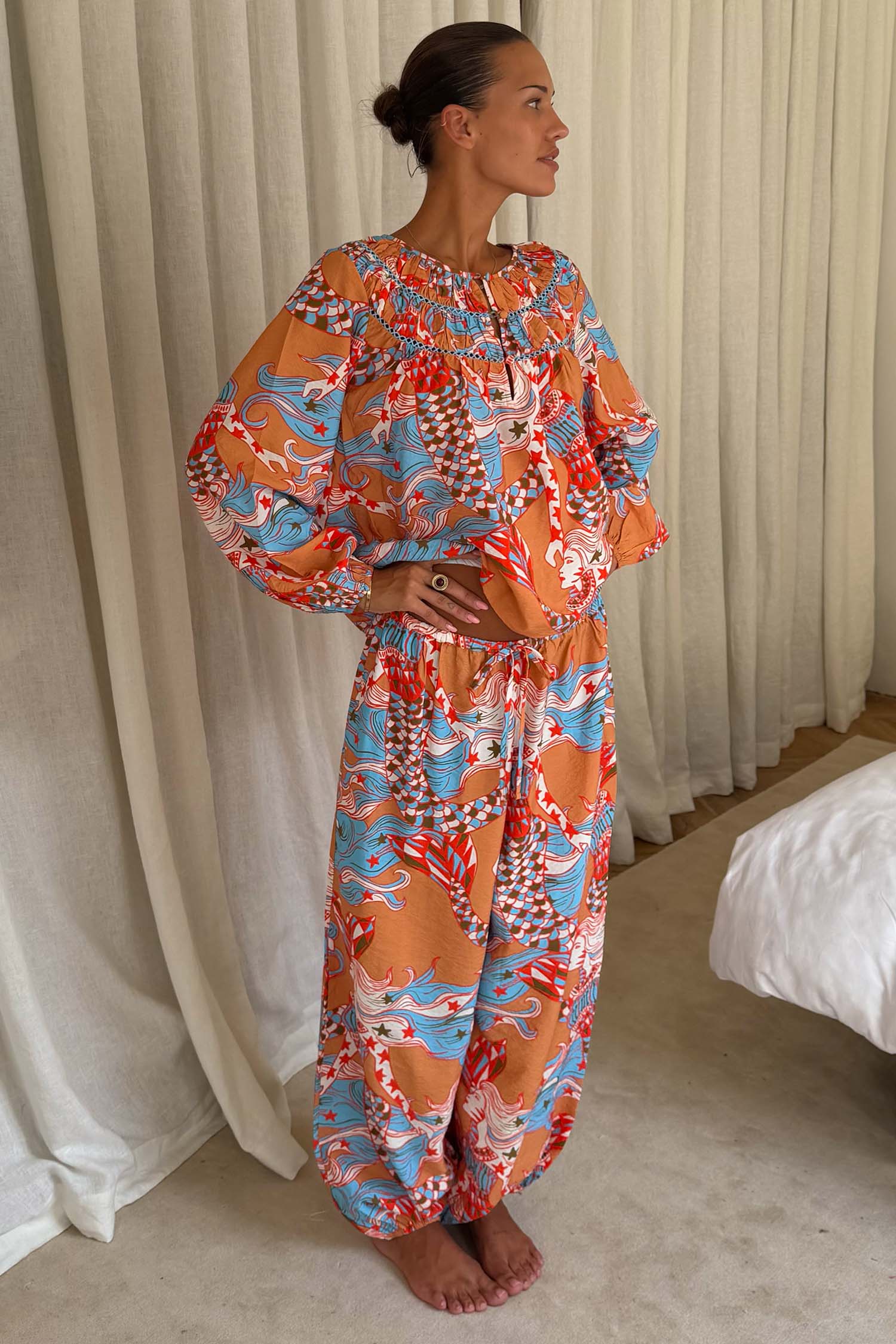 Model is 5ft4” and wears size M
