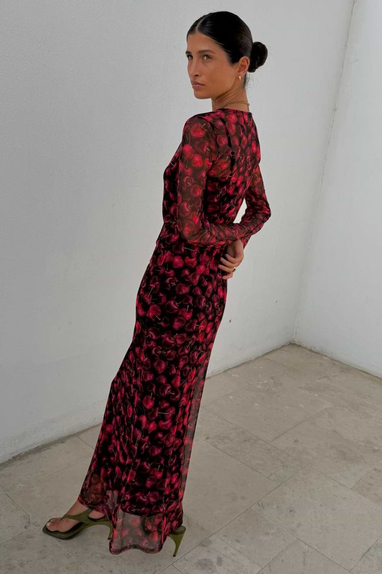 Cherry Mesh Soho Dress featuring a red digital cherry print, long sleeves and sheer mesh fabric.