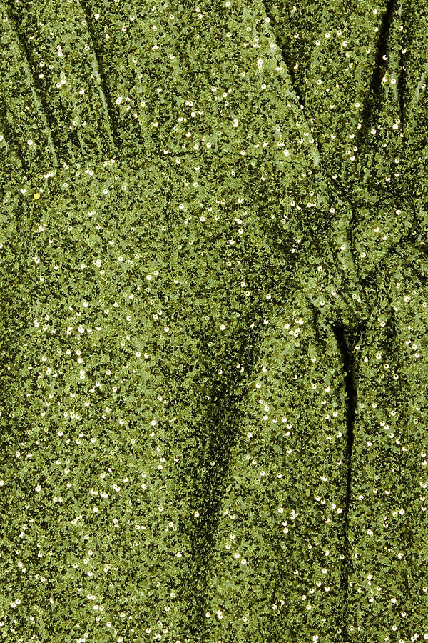 Olive Sequin Mini Vienna Dress detail highlighting the green sequin fabric and wrap tie fastening.