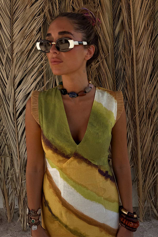 Green Ombre Deia Dress in earthy tones featuring a V-neckline and textured raffia shoulder trim.