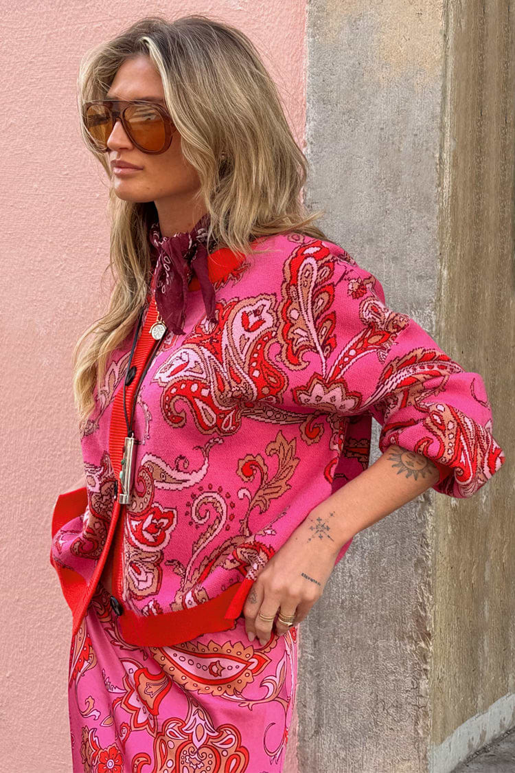 Pink Paisley Oslo Cardigan featuring a paisley print and red ribbed borders in a boxy knit fit.