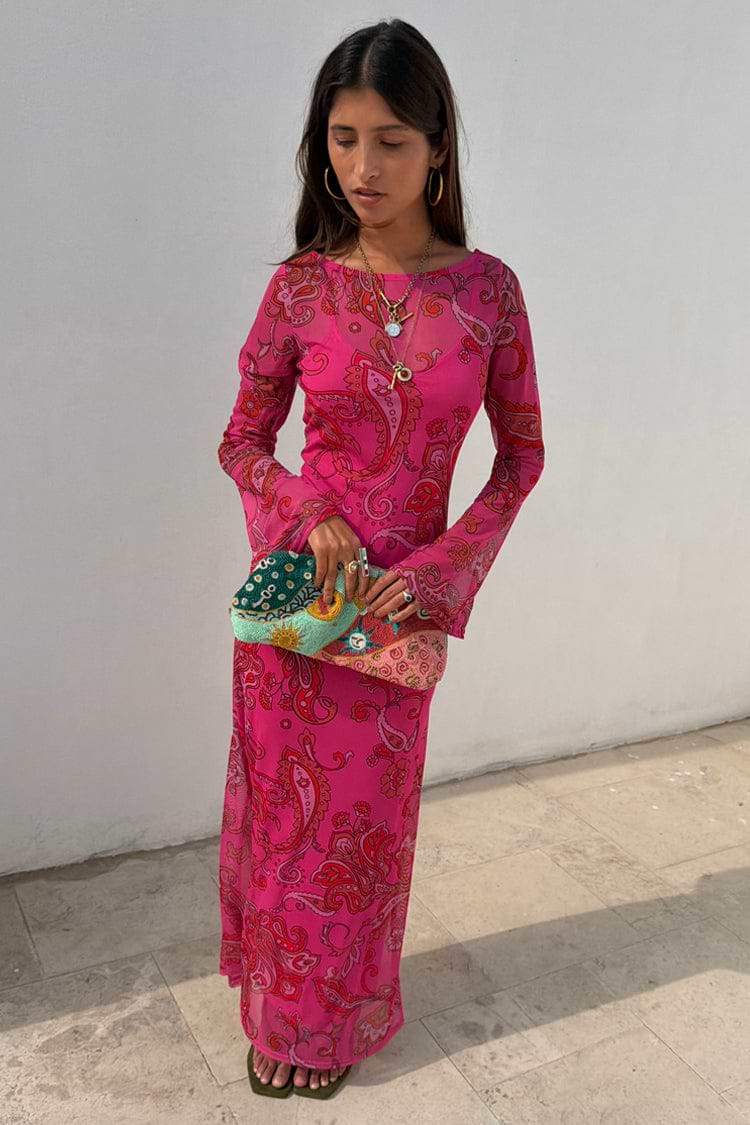 Pink Paisley Mesh Dress with long sleeves and a vibrant print, paired with a colourful beaded clutch bag.