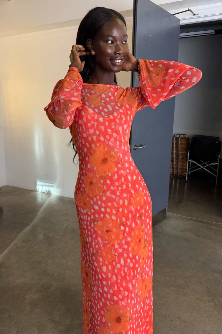 Coral Fawn Poppy Aria Dress featuring an orange poppy and white fawn print on a coral mesh fabric with flared sleeves.