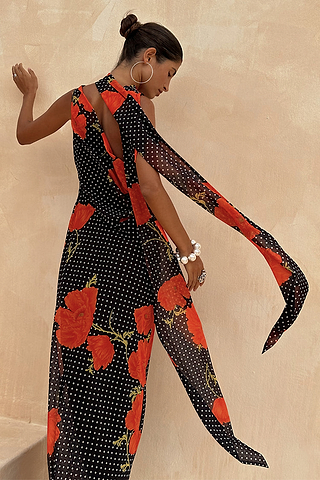 Black Poppy Sophie Dress with a red poppy and polka dot print and statement multi-wear scarf detail.