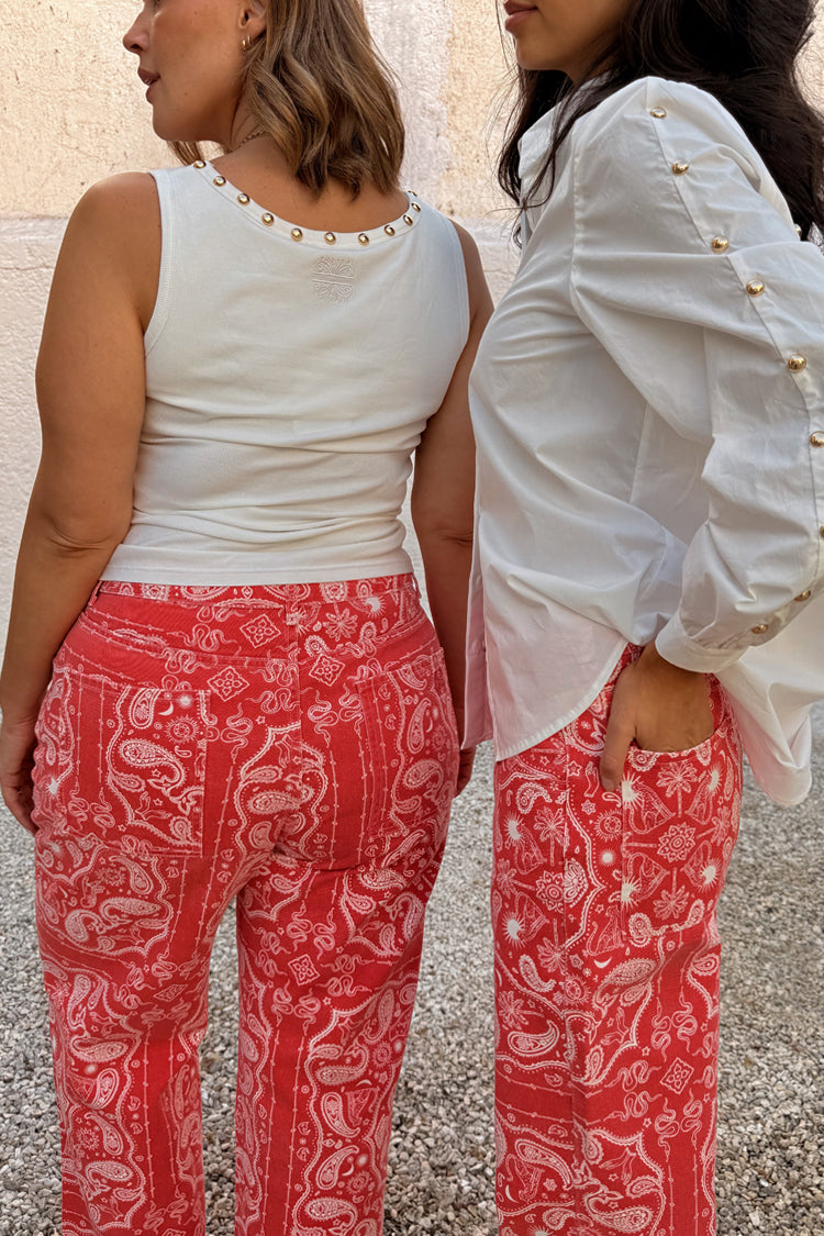 Red Bandana Jeans with a paisley print, shown on two models to highlight inclusive sizing.