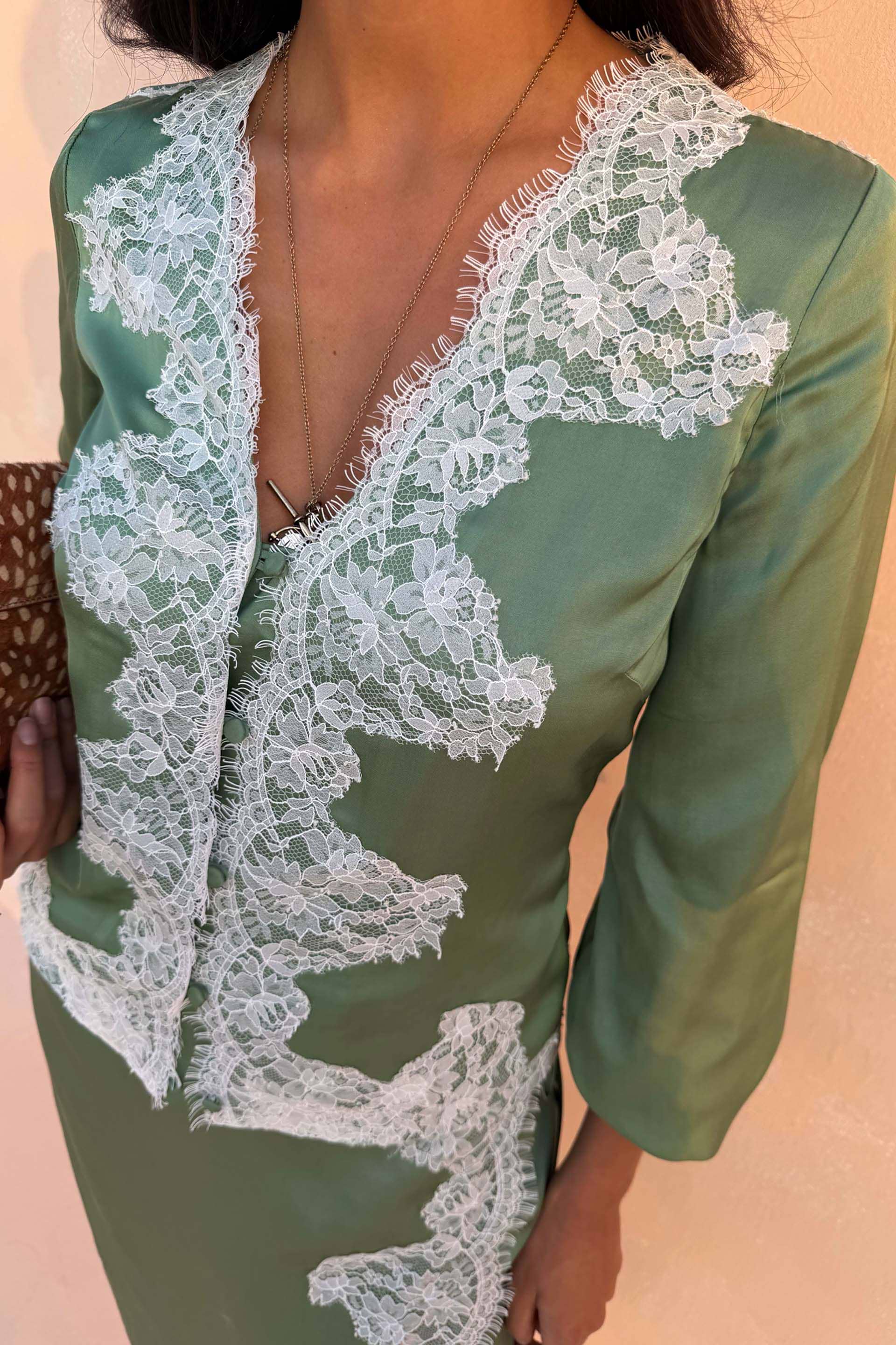 Green Lace Romi Top in soft green satin featuring contrast lace detailing and a button-down front.