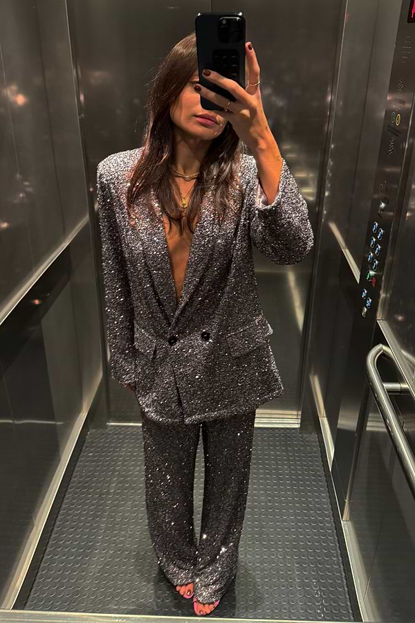 Gunmetal Sequin Freddie Trousers and matching blazer styled as a shimmering party co-ord in an elevator selfie.