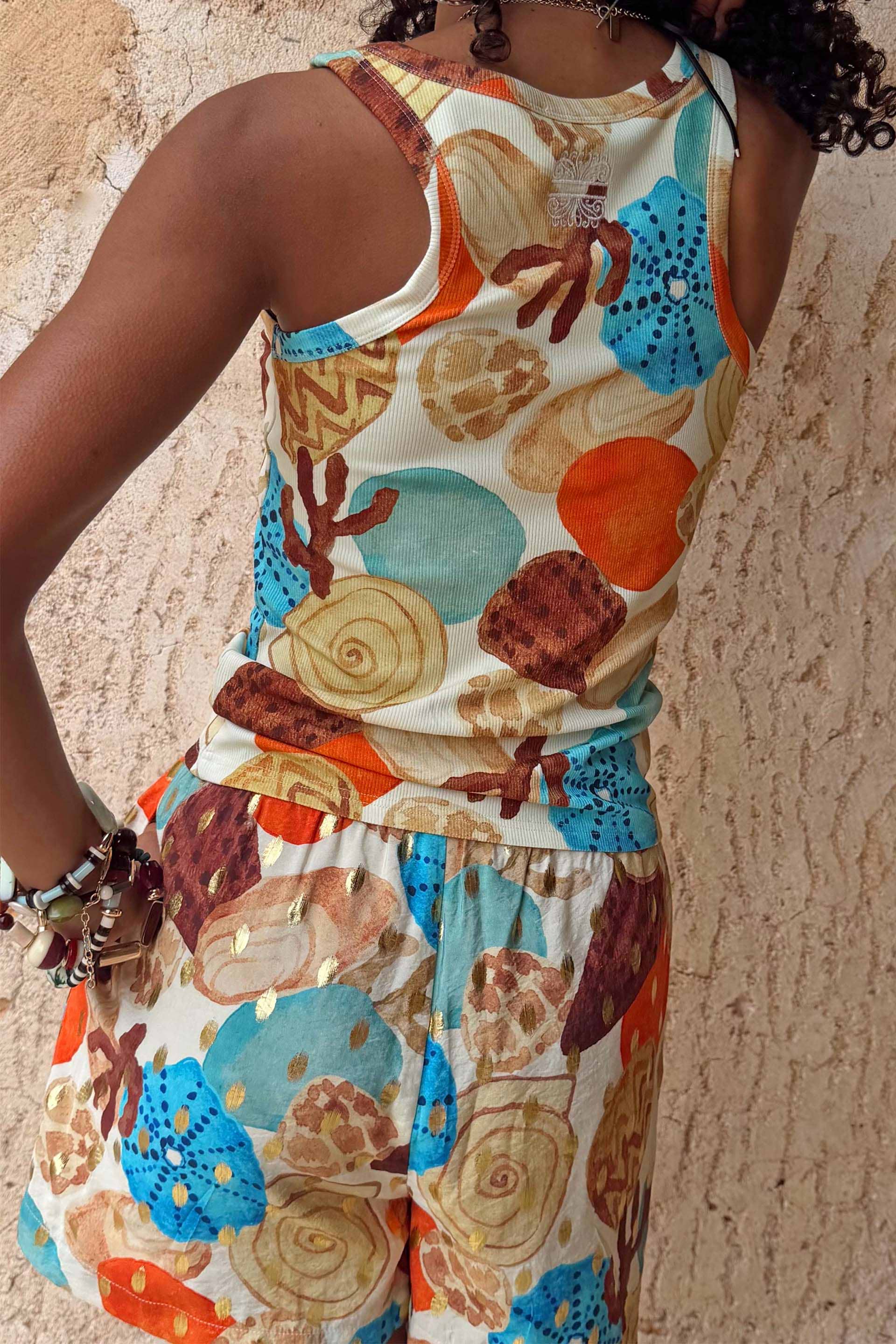 Shell Rib Tank with an abstract shell and starfish print in ocean tones, featuring a stretchy ribbed texture.