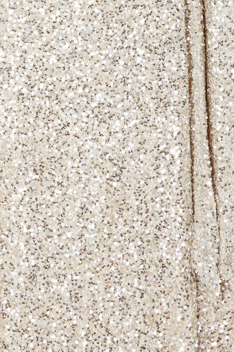 Silver Sequin Kira Wrap Dress fabric detail highlighting the texture of shimmering silver sequins.