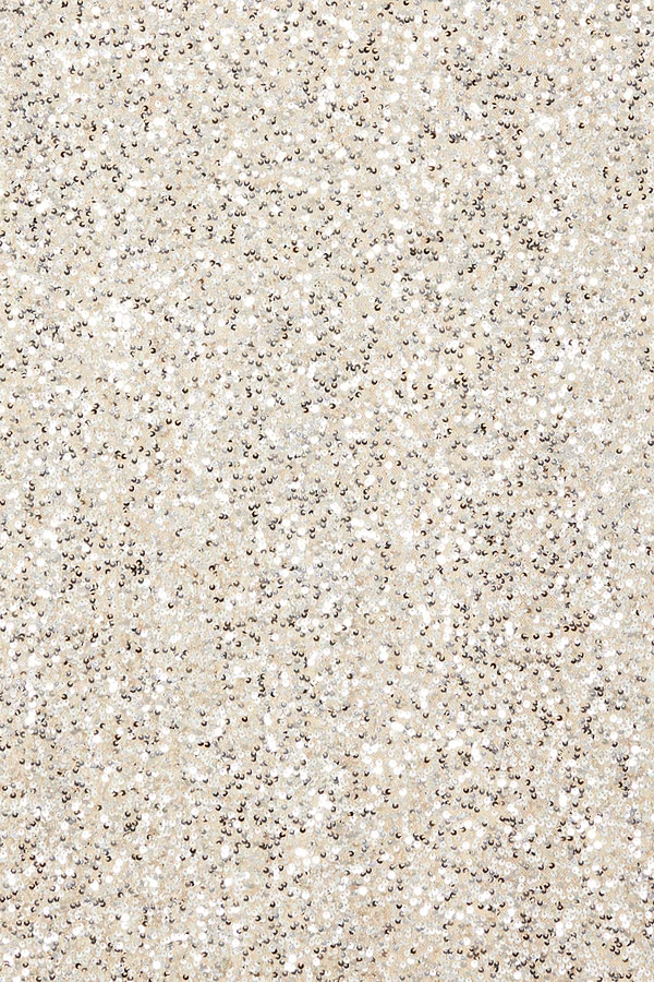 Silver Sequin Mini Soho Dress fabric detail featuring shimmering silver sequins on a neutral base.