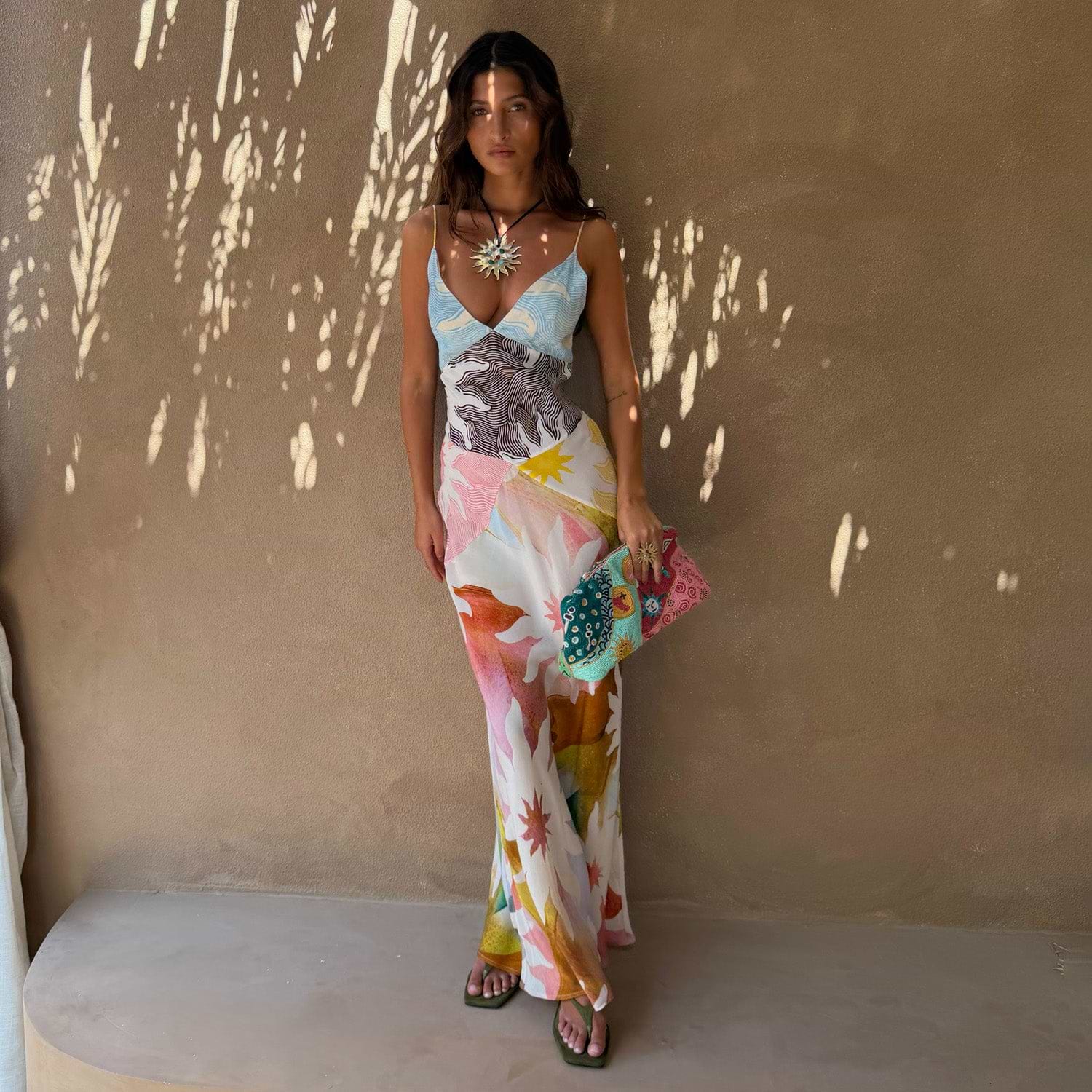 Abstract Soleil Emilia Dress in pastel colours with a soleil print, panel detailing and adjustable straps.