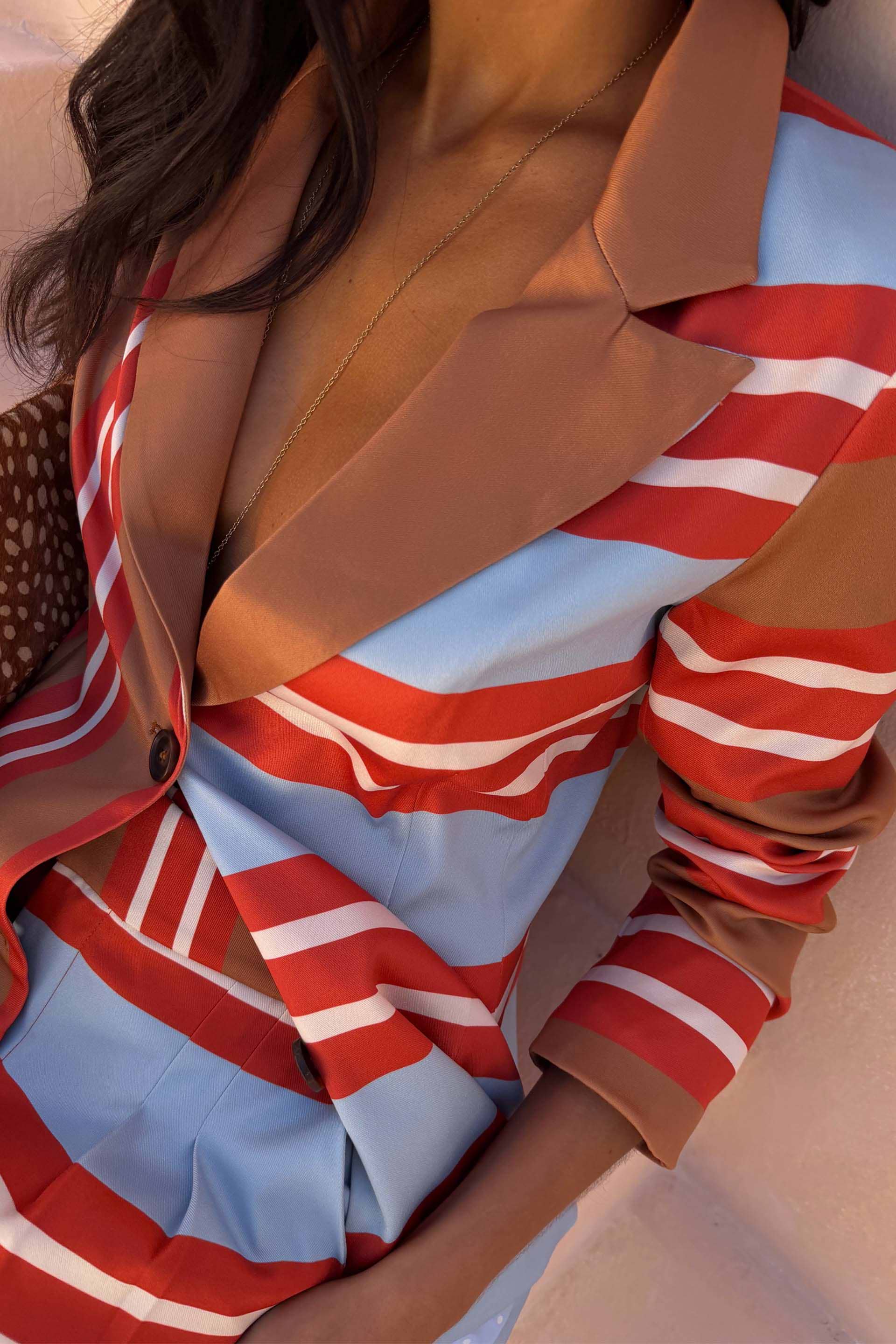 NFD Multi Stripe Blazer in red and blue with tan lapels and a structured silhouette in satin-esque fabric.