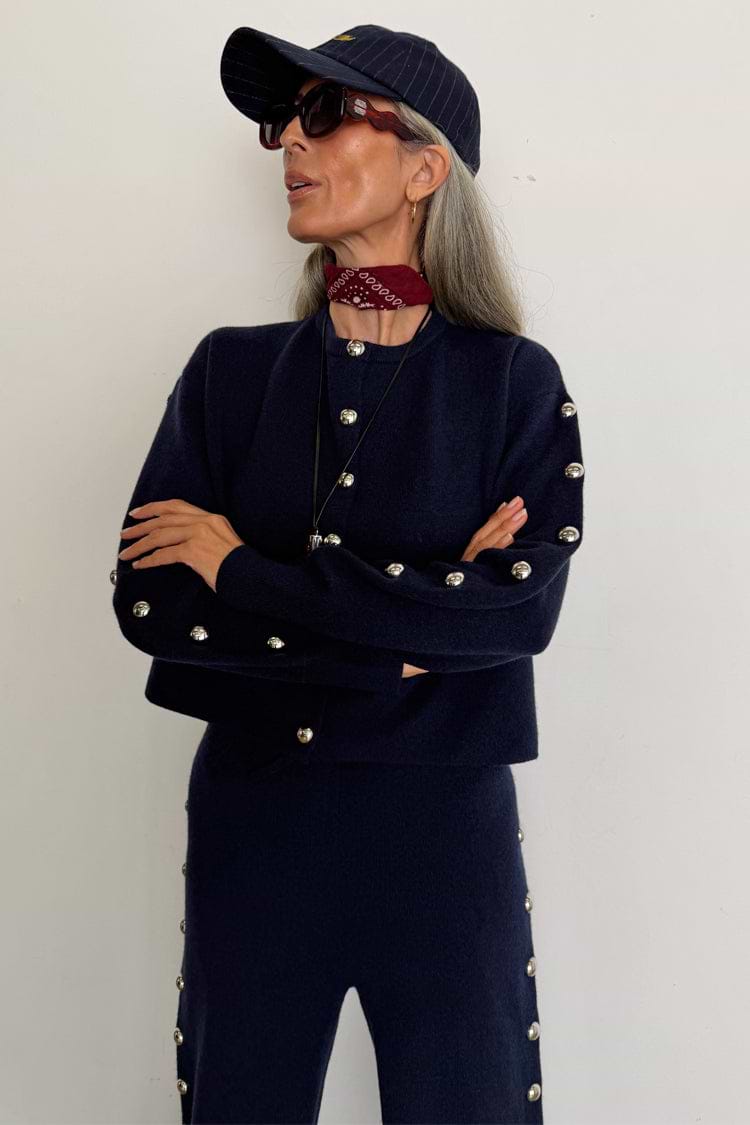 Navy Blue Studded Cardigan with silver stud detailing, styled as a knit co-ord for a London look.