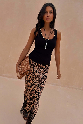 Black Studded Rib Vest with gold stud detailing at the neckline, styled with a leopard print midi skirt.