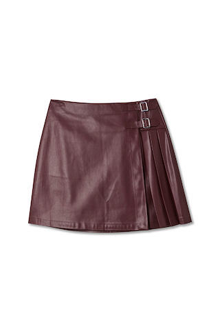 Burgundy vegan leather mini kilt skirt featuring pleated side detailing and silver-tone buckle fastenings.