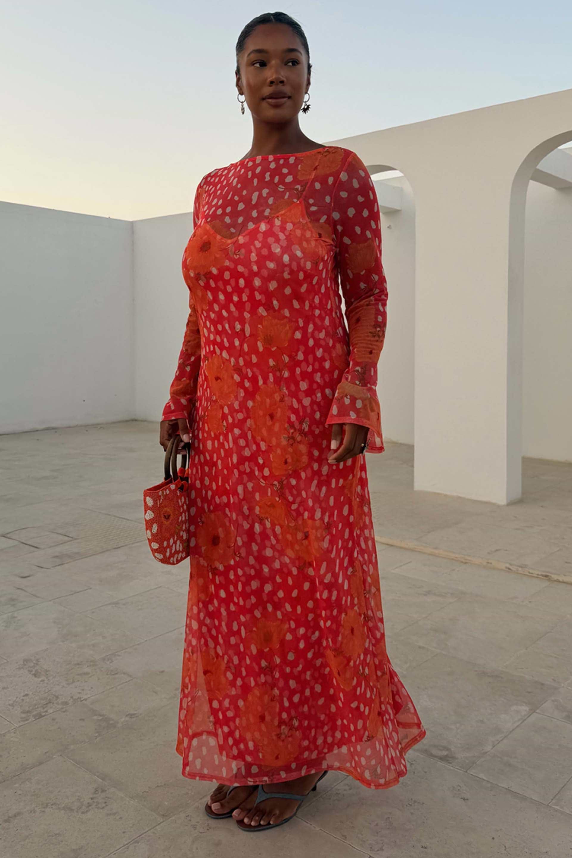 Coral Fawn Poppy Aria Dress in sheer mesh with a pink deer and orange poppy print, featuring flared sleeves.