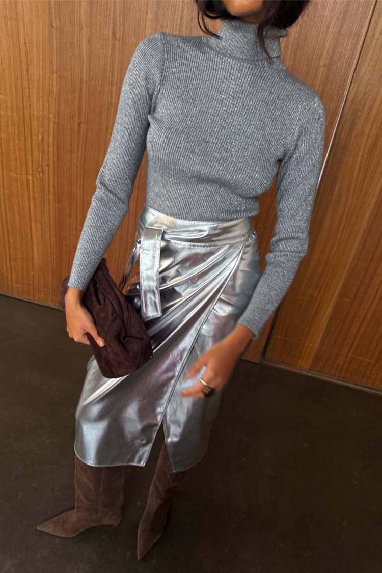 Gunmetal Rib Knit Jumper with a roll neck and silver flecks, styled with a silver metallic wrap skirt.