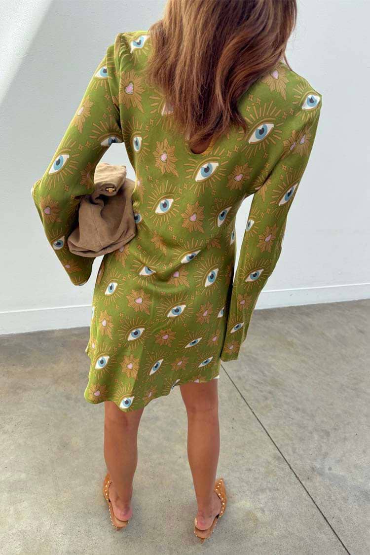 Khaki Eye Mini Soho Dress with the iconic eye print, flared sleeves and a back keyhole button fastening.