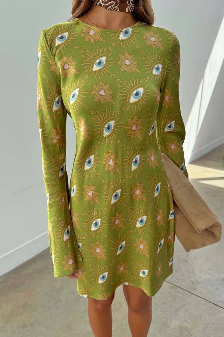 Iconic Khaki Eye Mini Soho Dress featuring a green eye print, flared sleeves and an hourglass silhouette.