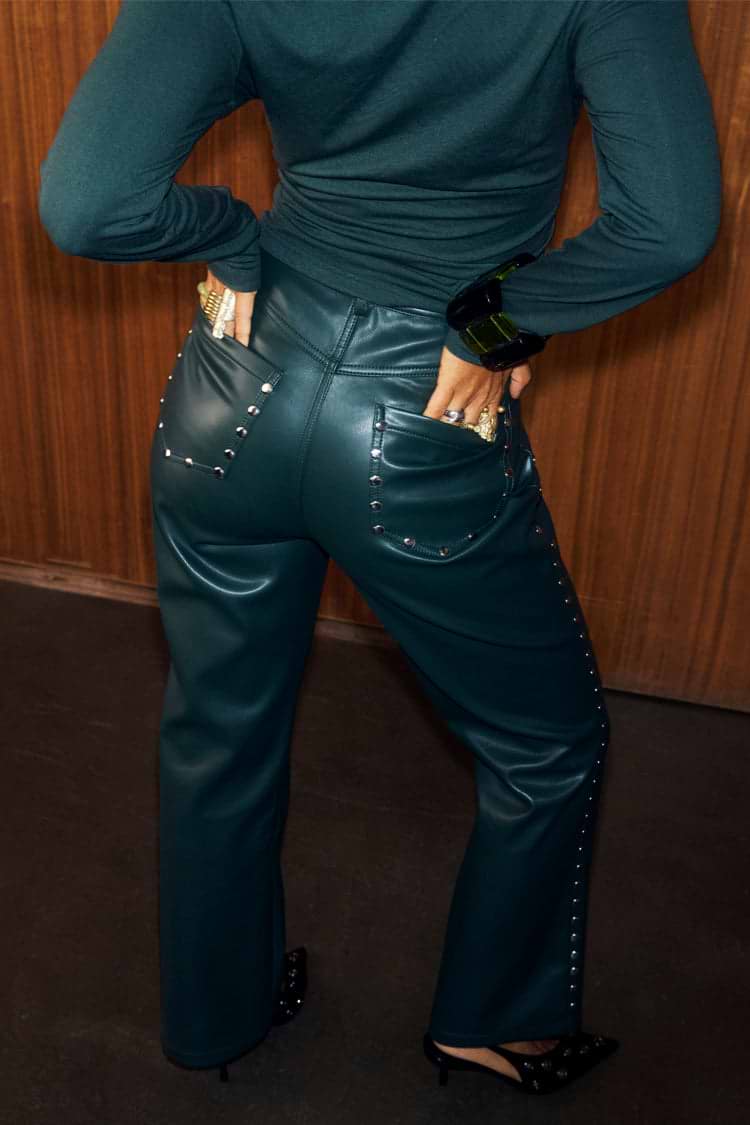 Bottle Green Studded Vegan Leather Trousers with silver stud detailing on back pockets and side seams.