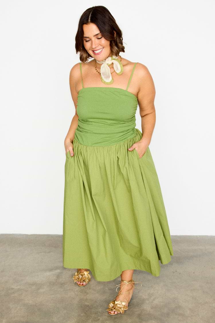 Olive green Lola Mid-axi Dress featuring a ruched bodice and full cotton skirt, designed for inclusive sizing.