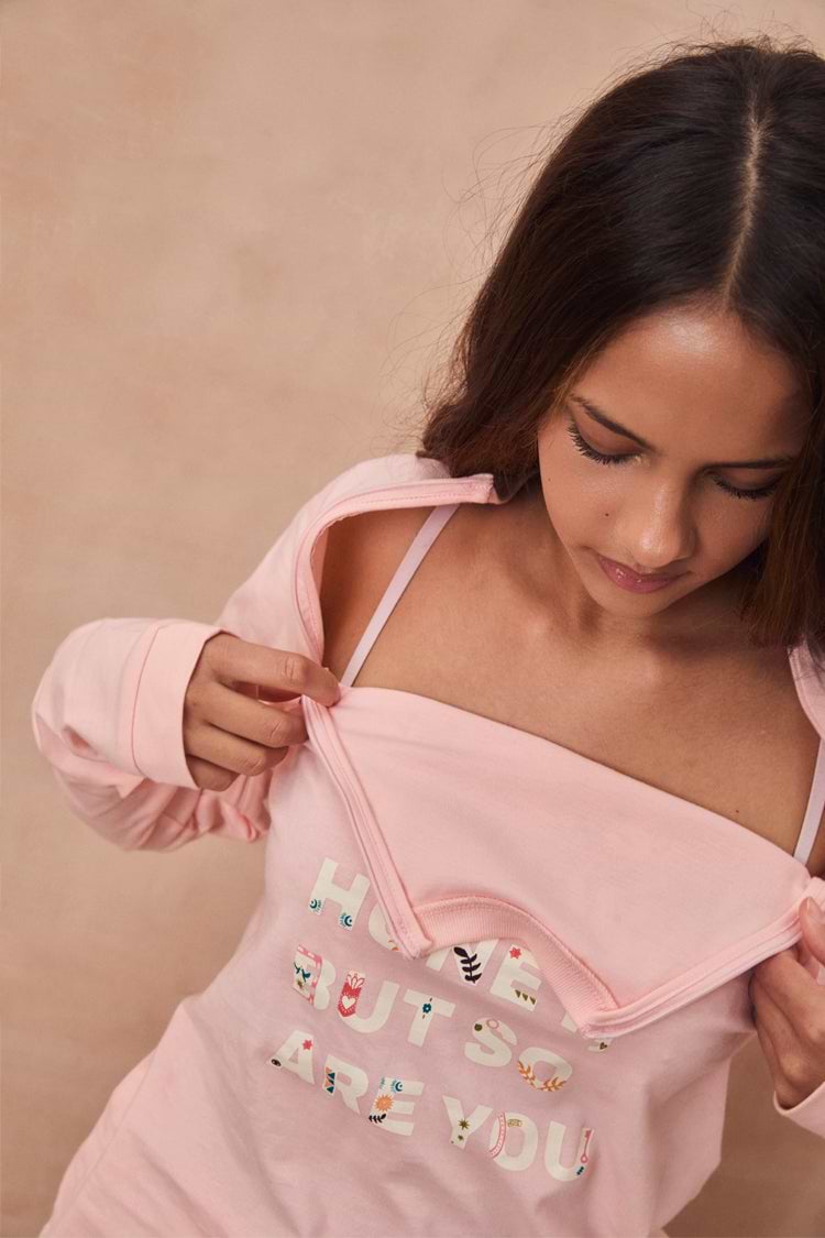 Pink Life is Tough Accessible T-Shirt with concealed neck zips and colourful printed motifs on a model.