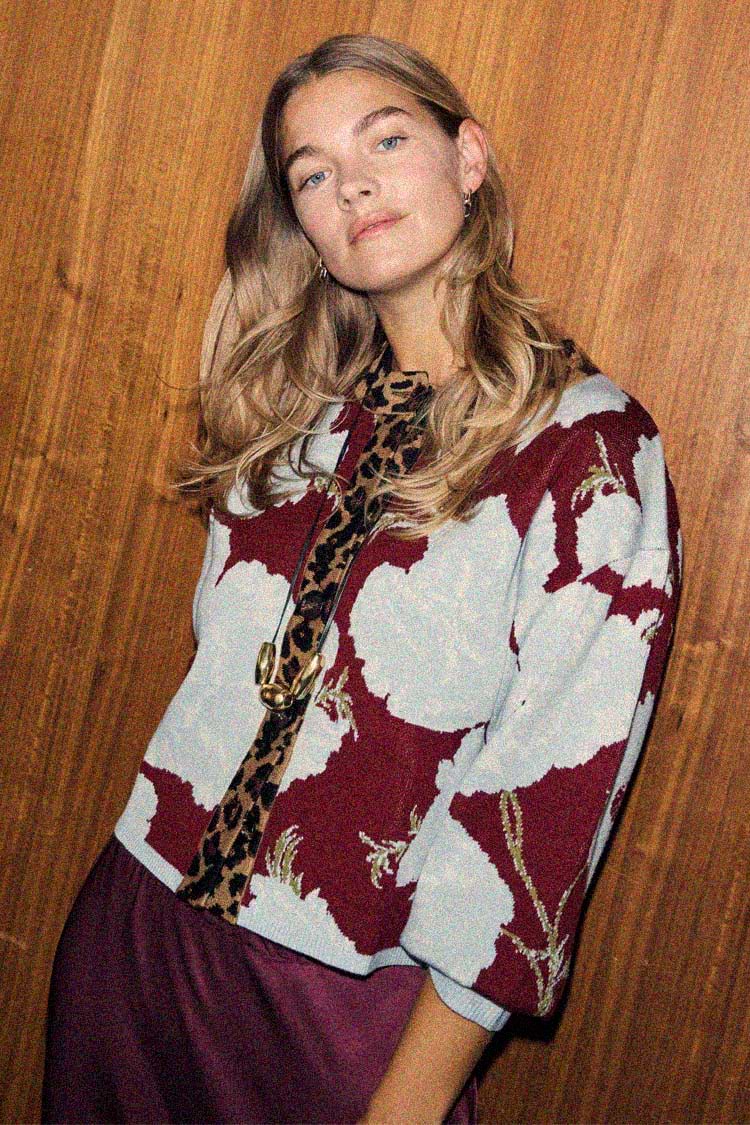 Burgundy & Blue Poppy Cardigan with leopard print trim and wide sleeves, styled over a burgundy dress.