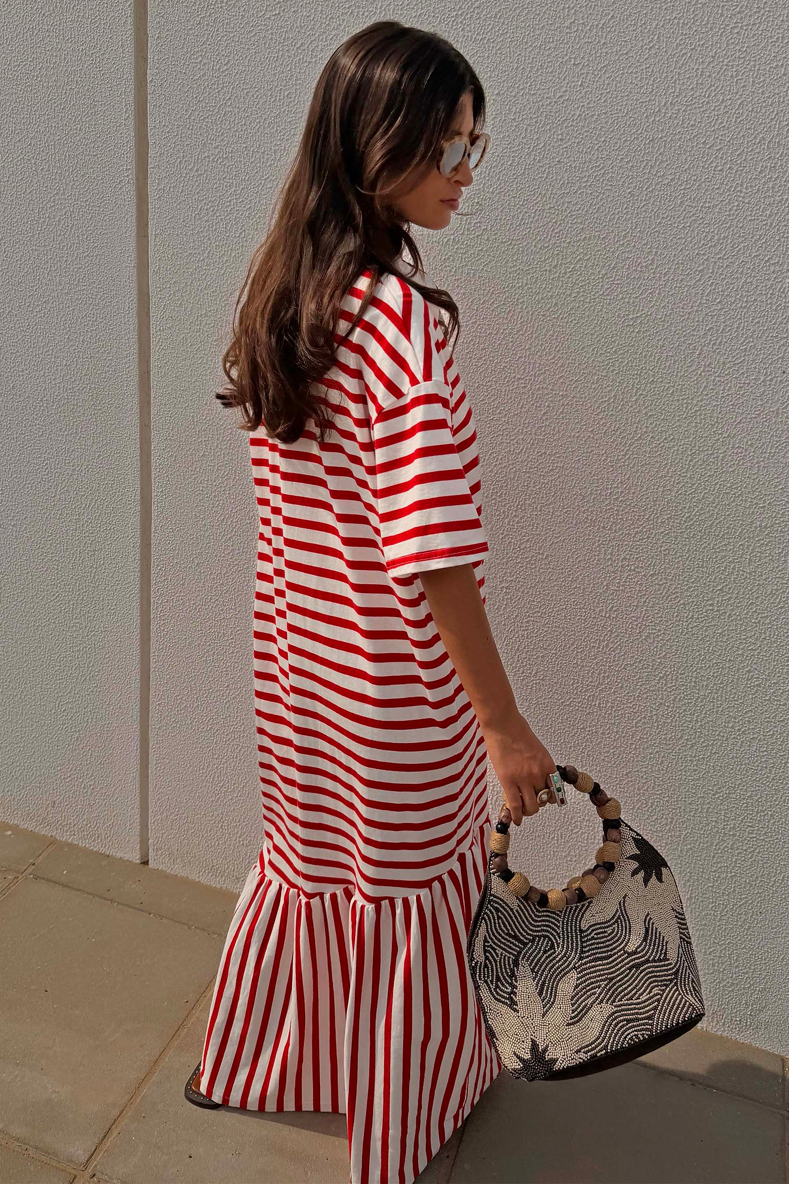 Red Stripe Jersey Dress in cotton with an asymmetric gathered skirt and oversized T-shirt fit, shown on a model.