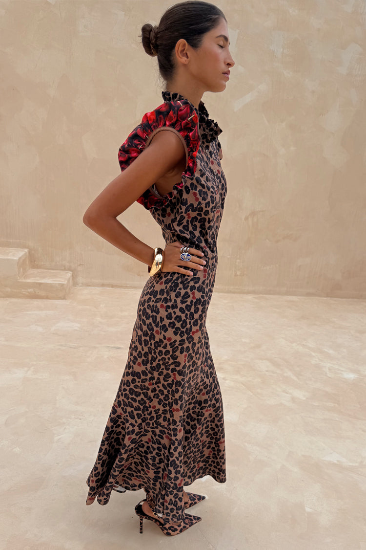 Cherry Leopard Remi Dress with pleated frills and a high neck, styled with matching leopard print heels.