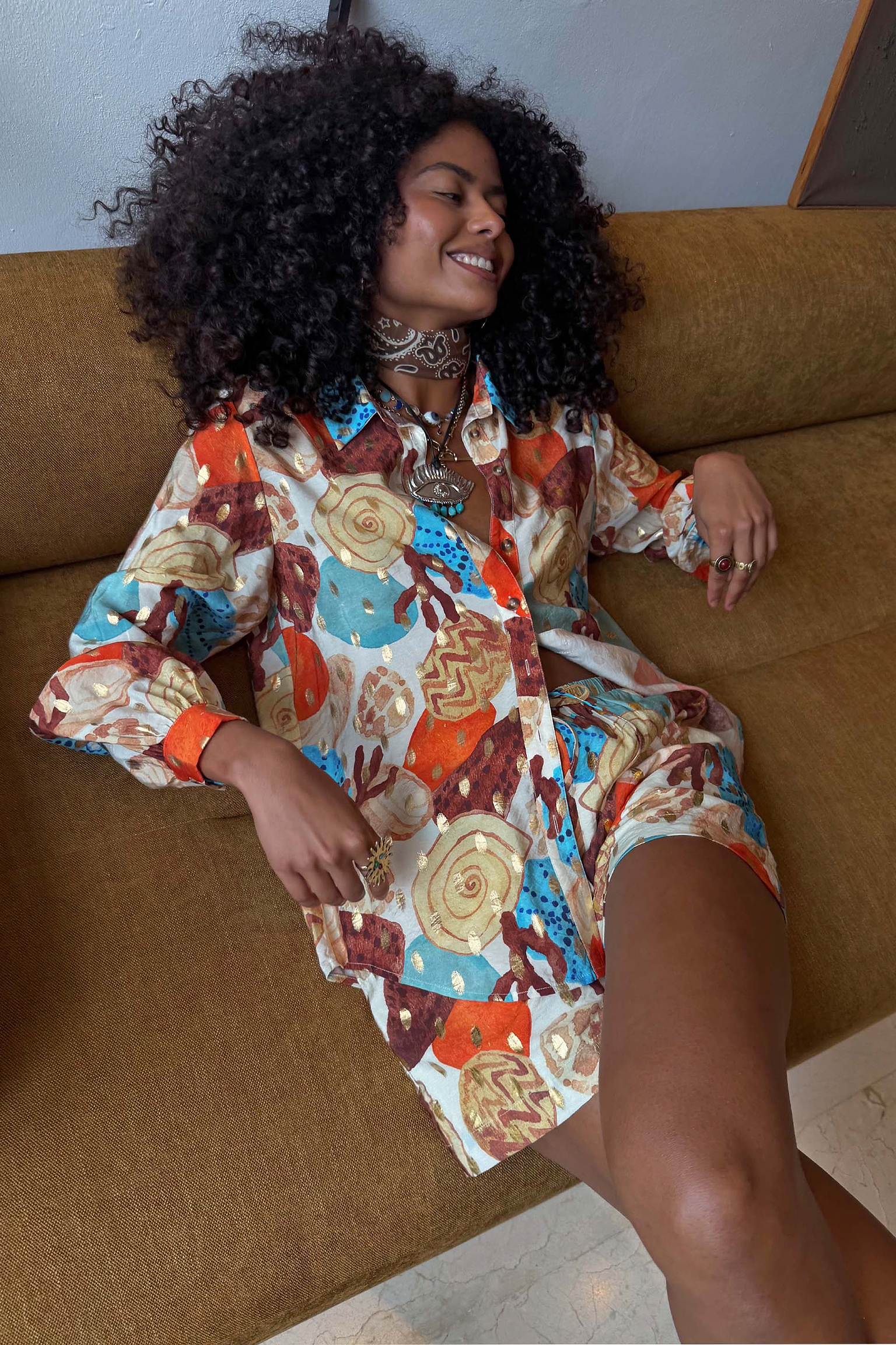 Shell Marley Shirt in a multi-colour abstract shell print with metallic flecks, styled as a multi-wear co-ord.