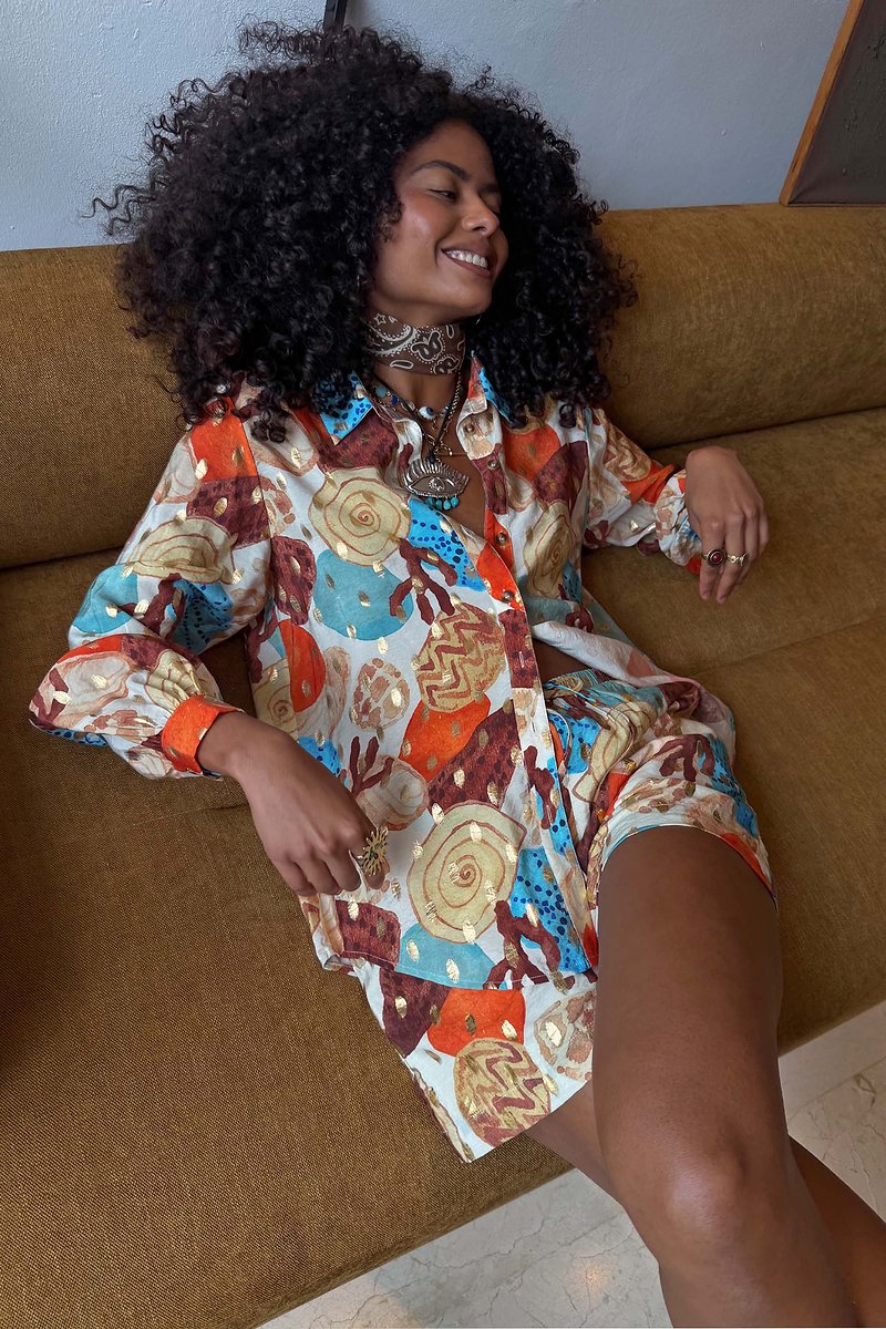 Shell Marley Shirt in a multi-colour abstract shell print with metallic flecks, styled as a multi-wear co-ord.