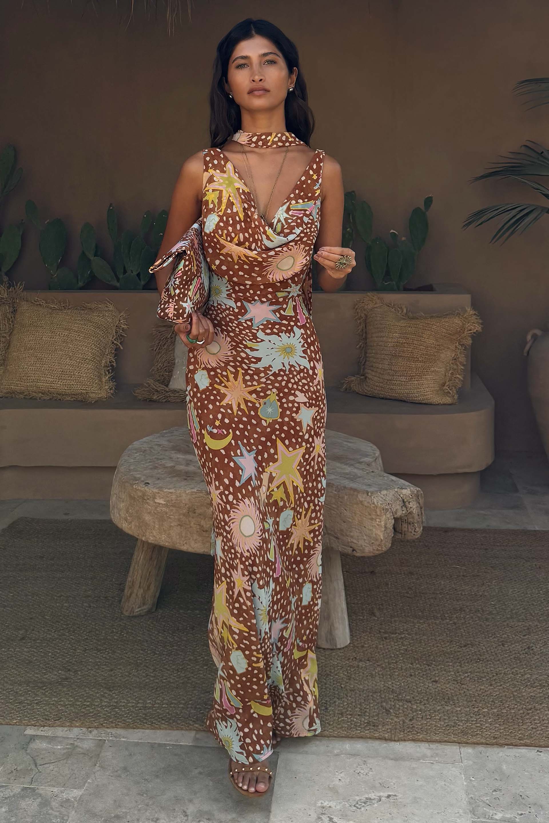 Star Fawn Sophie Dress in brown with celestial motifs, a draped front and detachable multi-wear scarf.