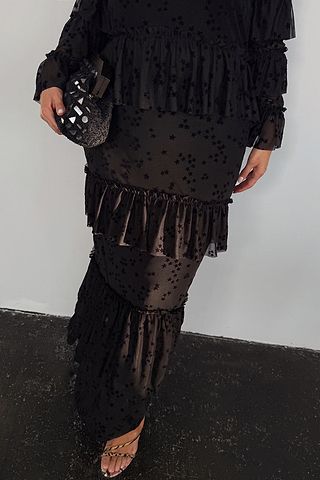 Black Star Devore Felicity Dress with tiered mesh ruffles and velvet star motifs, highlighting inclusive sizing.